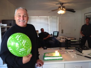 It was Jeff Brown's (with the balloon looking all geedy) birthday this week! Yay! We had Tres Leches cake and In-N-Out. That's Robert Estus (sitting) our dispatcher and Mike Altman, VP of Ops, in the background